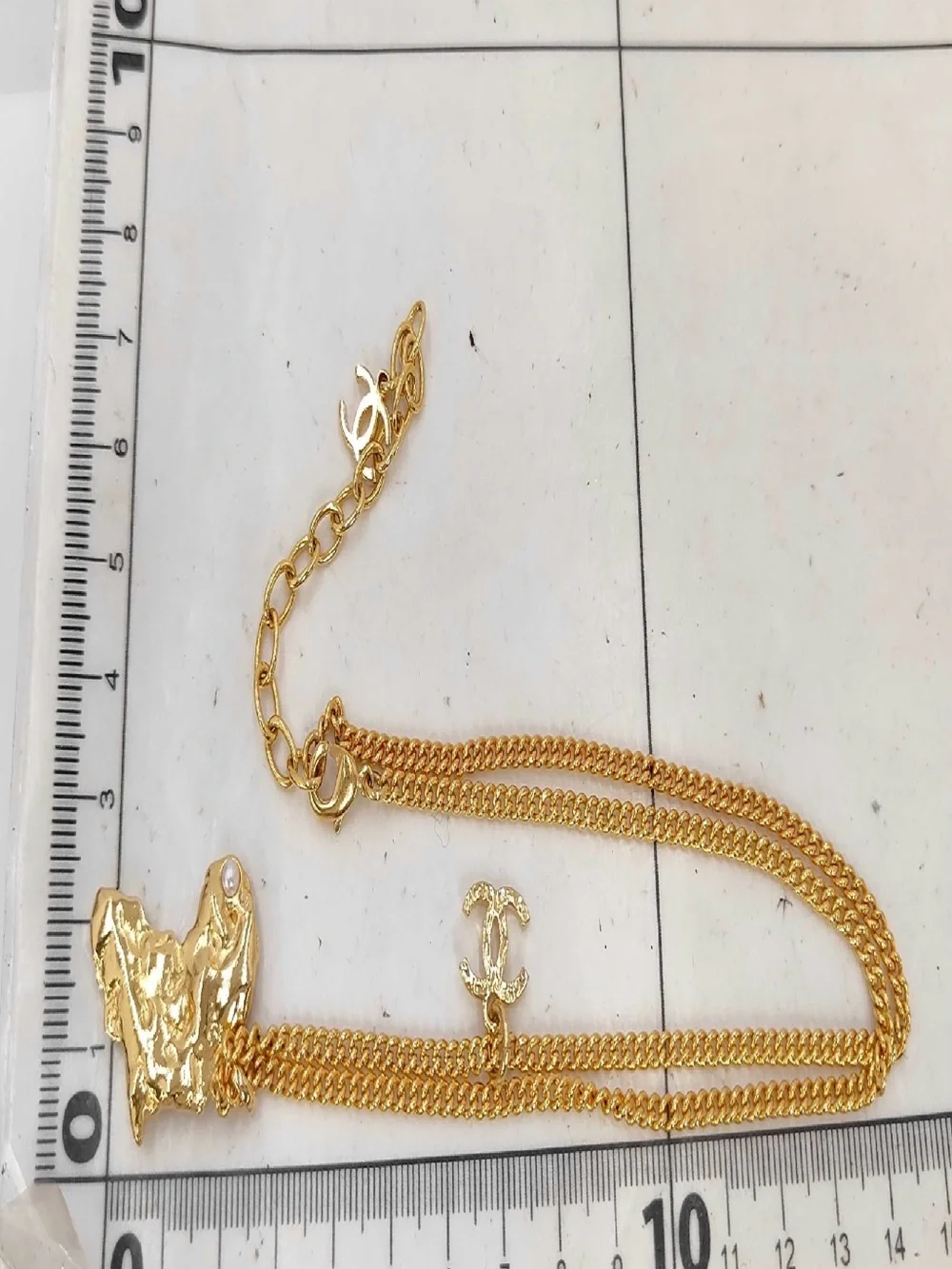CHANEL Gold-Tone Africa Map Pendant Necklace with Pearl Detail